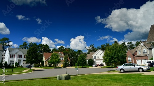 Time lapse of idyllic suburbs and rolling cumulus clouds