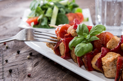 Chicken Skewer on wooden background