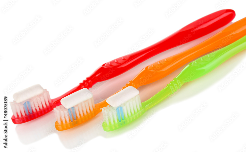 Toothbrushes and chewing gum isolated on white Toothbrushes and chewing gum isolated on white