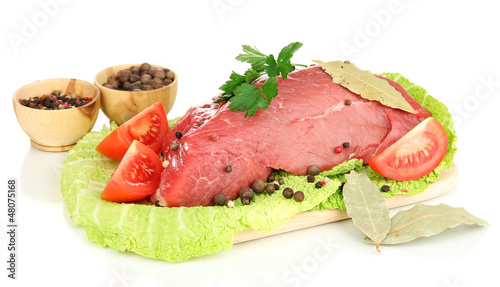 Raw beef meat marinated with herbs and spices isolated on white