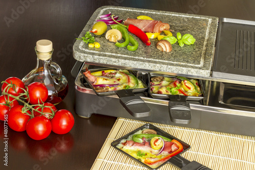 Raclette with cheese, vegetables &  ham