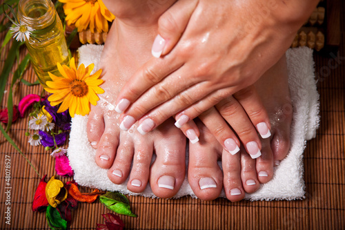 Woman's french manicure and pedicure 