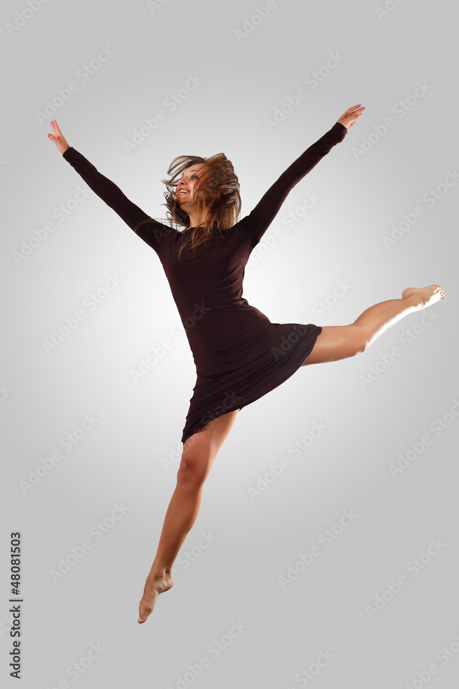 Young female dancer jumping Young female dancer jumping
