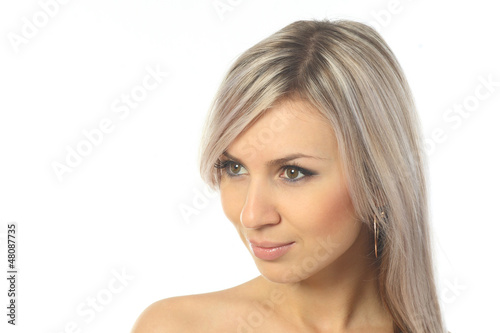 Portrait of an attractive blonde girl and positive