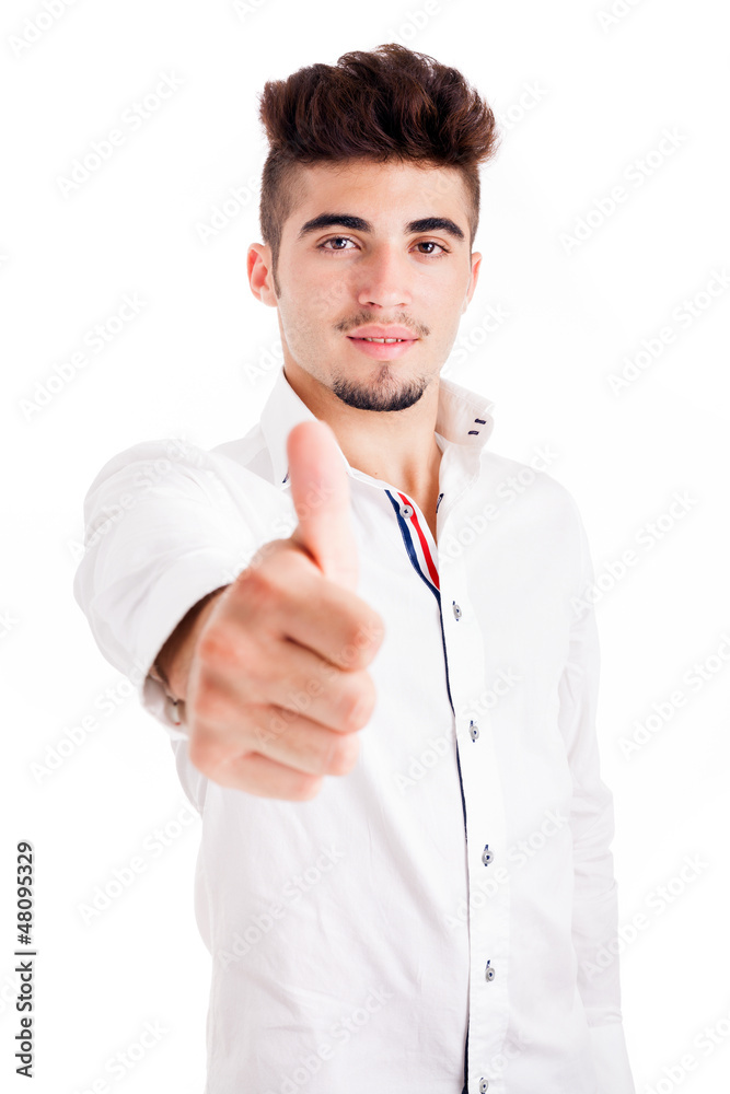 young casual man thumb up in a white background young casual man thumb up in a white background