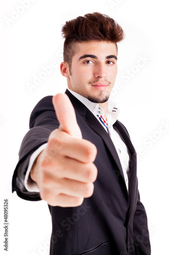 Young business man thumbs up, isolated on white