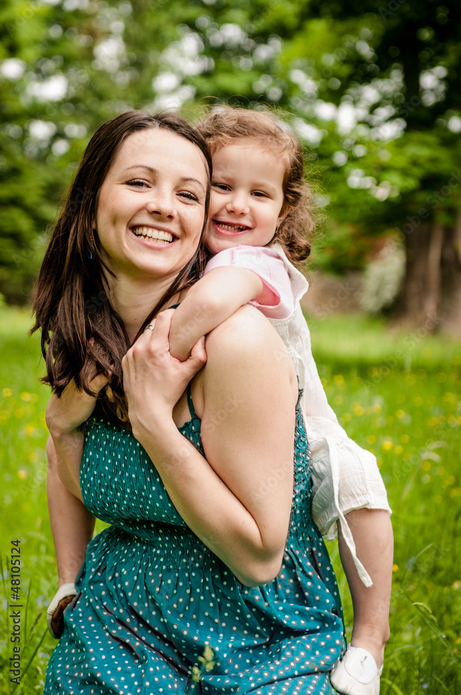 Naklejka premium Happy mother with child