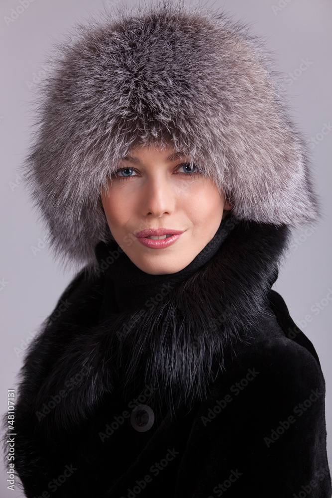 Beautiful woman in a fur hat and coat Beautiful woman in a fur hat and coat