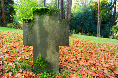 Grave headstone in fall