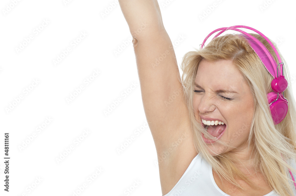 Woman enjoying loud music. Rock on Woman enjoying loud music. Rock on