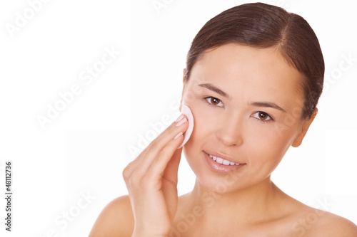 woman touching pure cotton pad face