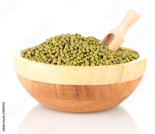 Green mung beans  with scoop in bowl isolated on white photo
