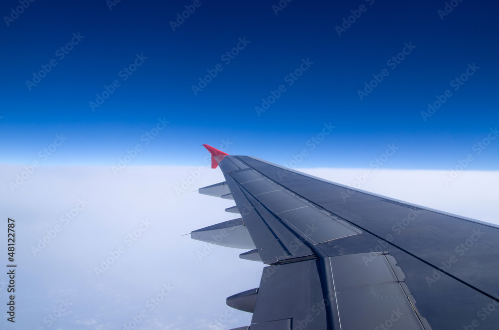 View out of airplane Airplane wing in flight View out of airplane Airplane wing in flight