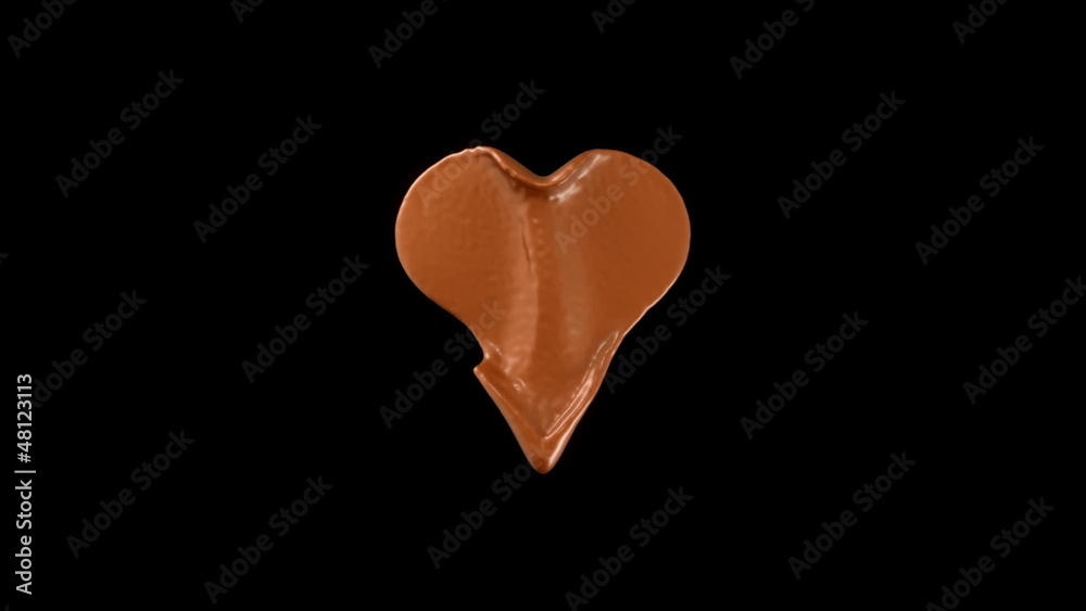 Heart hot chocolate shape splashes with slow motion. Alpha Heart hot chocolate shape splashes with slow motion. Alpha