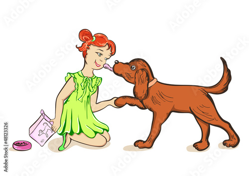 Girl feeds a dog