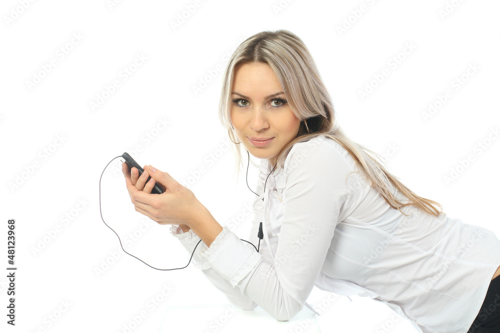 Beautiful girl in a business suit talking on a cell phone Beautiful girl in a business suit talking on a cell phone