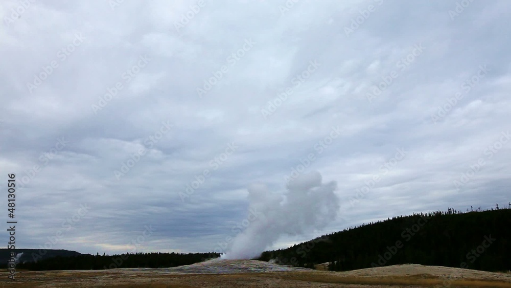 Eruption of Old Faithful geyser at Yellowstone National Park Eruption of Old Faithful geyser at Yellowstone National Park