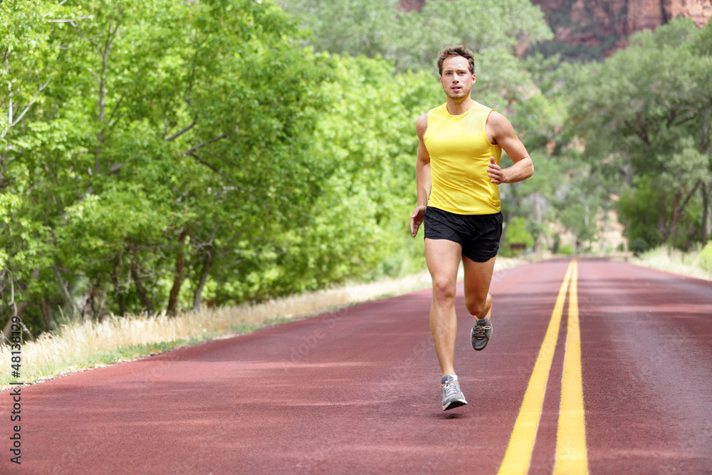 Runner man running on road Runner man running on road