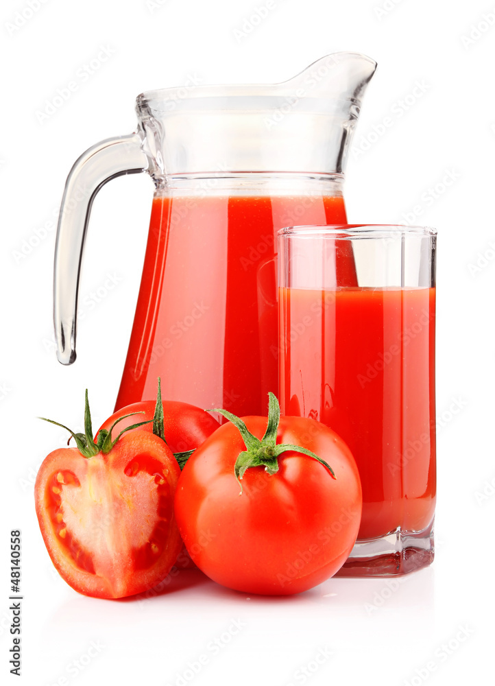 Jug and glass of tomato juice with fruits isolated Jug and glass of tomato juice with fruits isolated