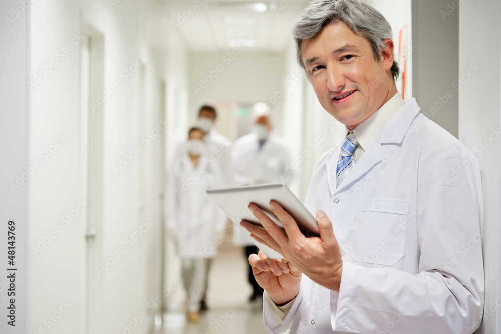 Doctor Holding Digital Tablet