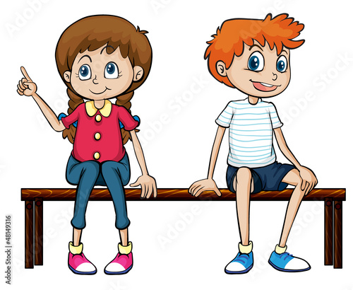 A boy and a girl sitting on a bench