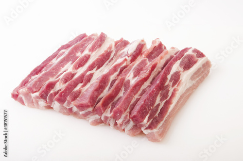 raw pork in white background
