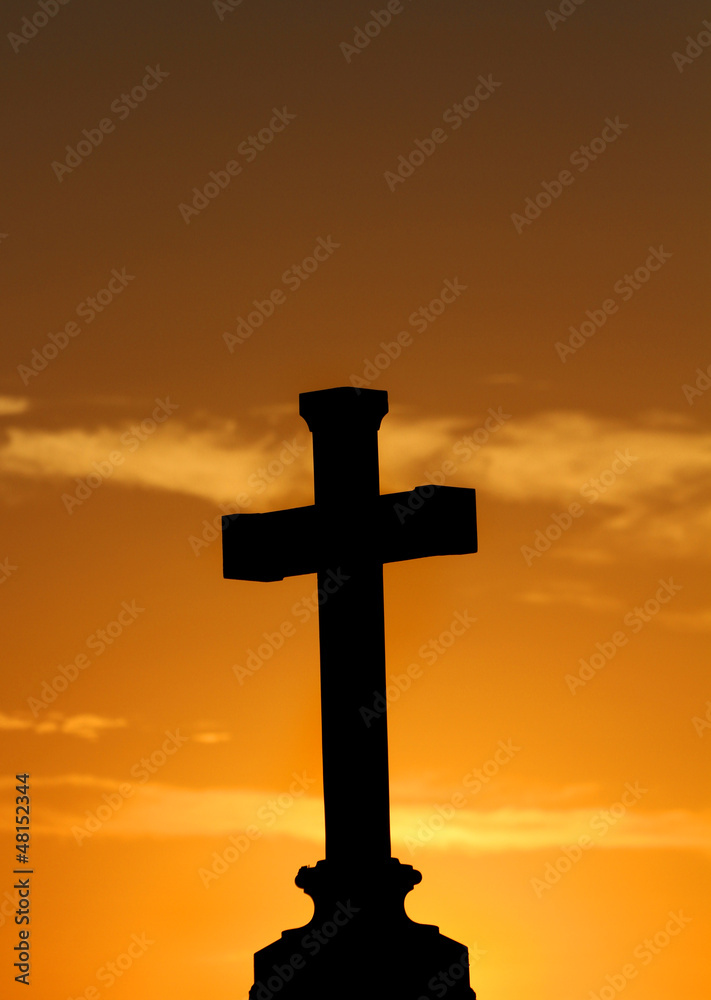 Cross with orange sunset