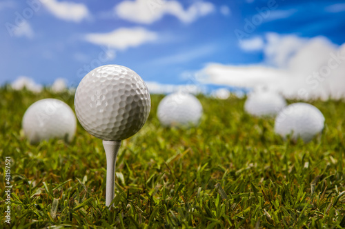 Golf theme on green grass and sky background