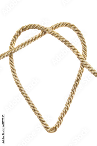 Heart Shaped Knot on a golden rope isolated