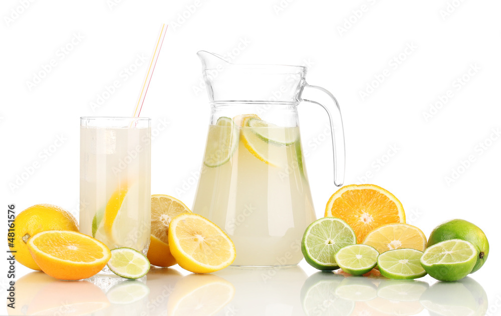 Citrus lemonade in pitcher and glass of citrus around isolated Citrus lemonade in pitcher and glass of citrus around isolated