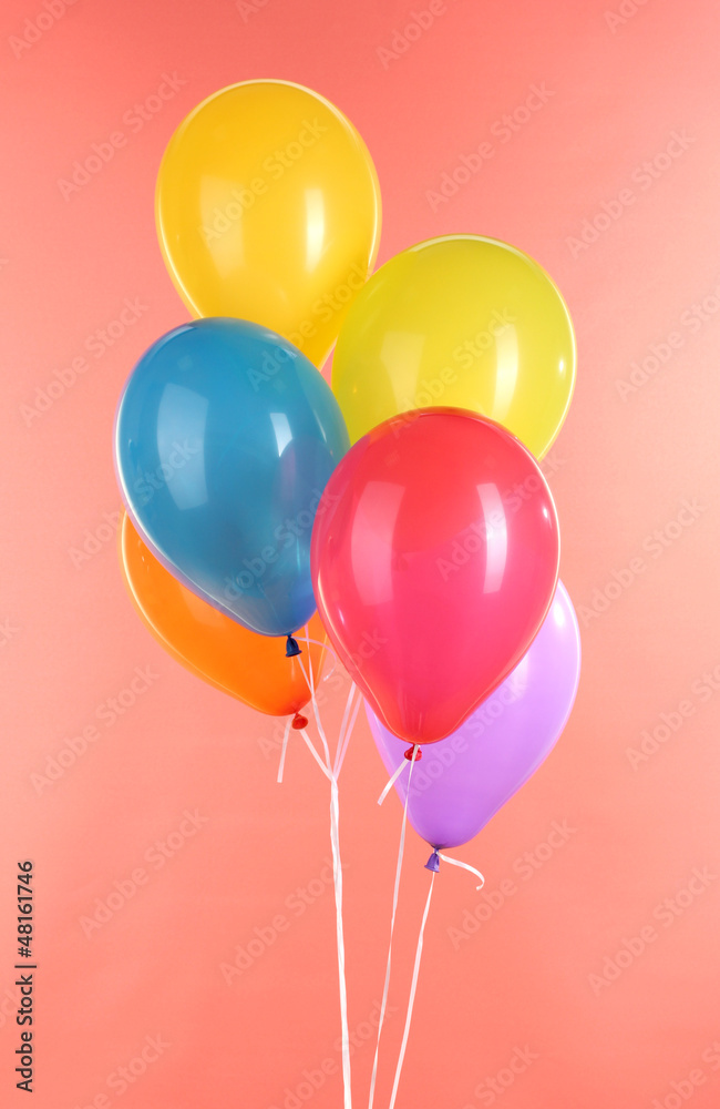 colorful balloons on red background