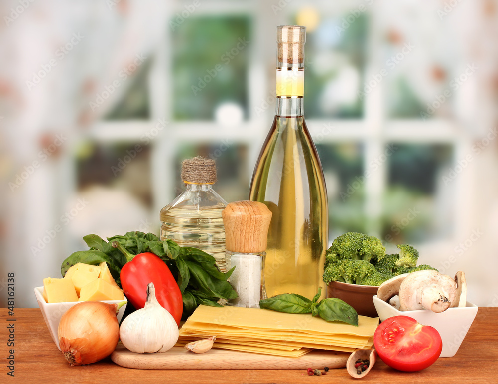 Vegetarian lasagna ingredients on bright background Vegetarian lasagna ingredients on bright background