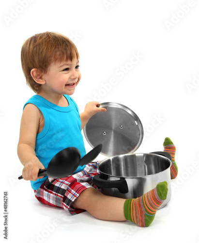 cute little boy with kitche...