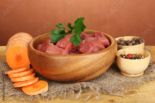 Raw beef meat marinated with herbs and spices