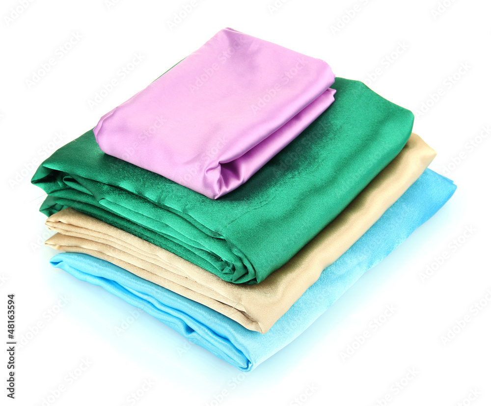 heap of cloth fabrics isolated on white heap of cloth fabrics isolated on white