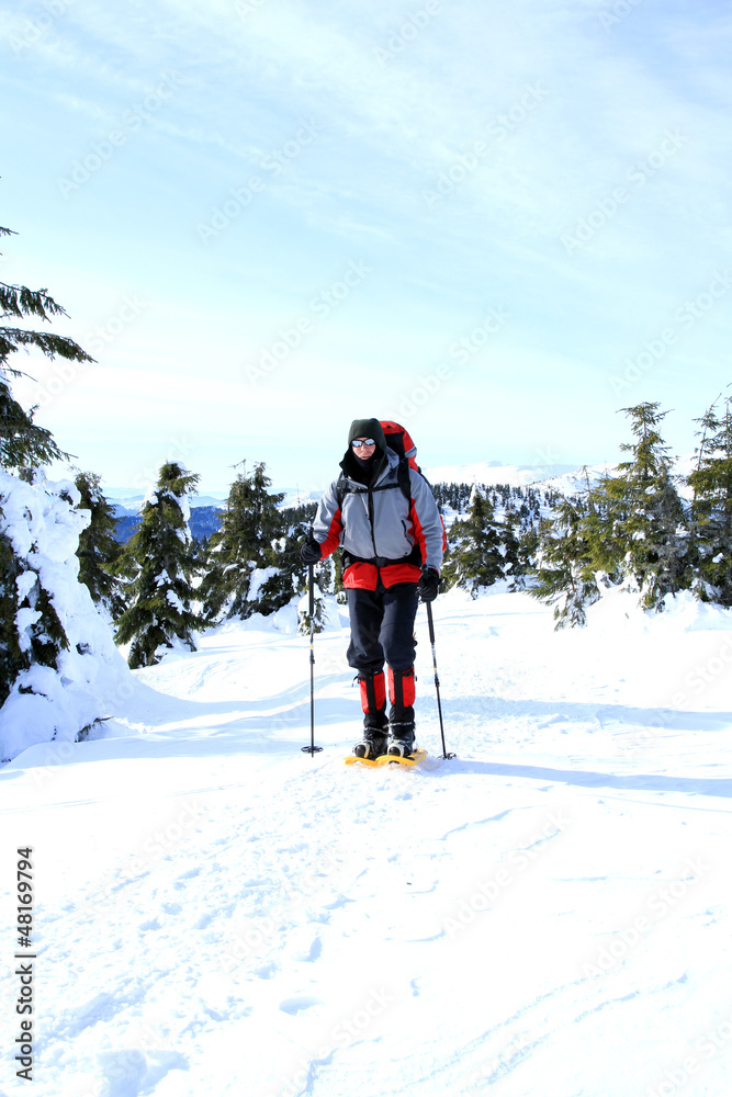 Winter hiking in snowshoes.