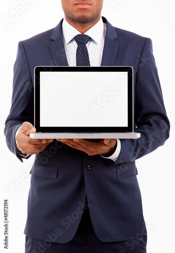 African American business man with a laptop computer isolated ov