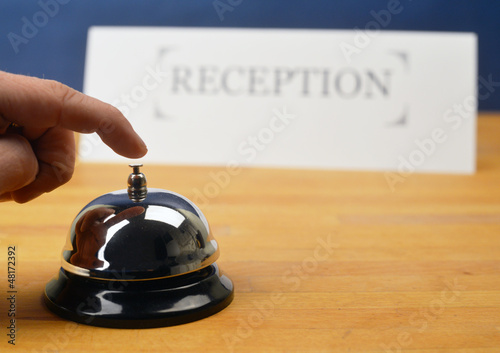 Reception with bell and hand call for service