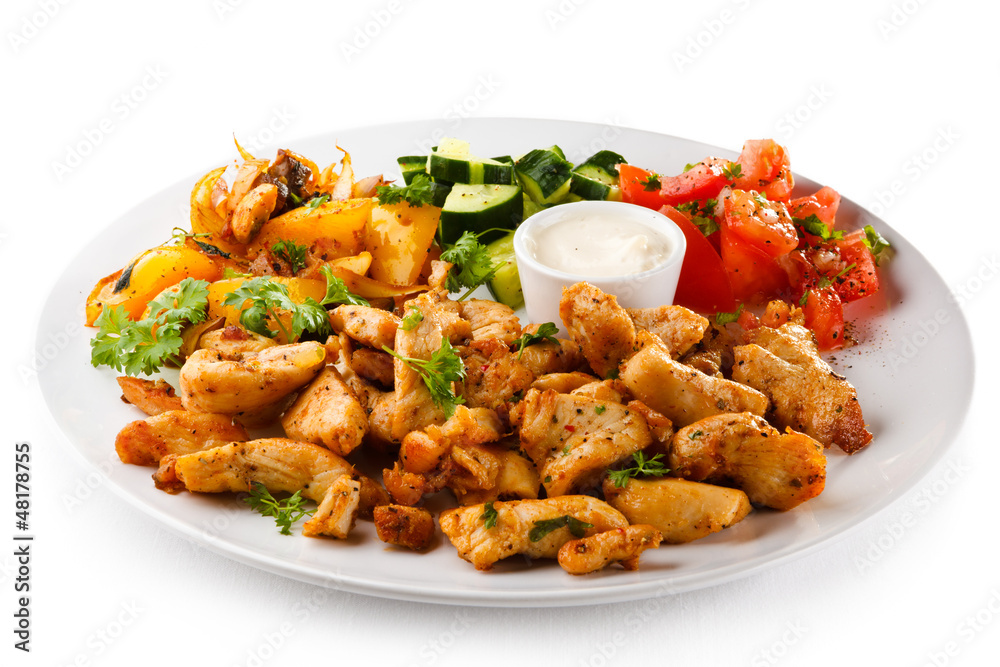 Grilled meat and vegetables on white background Grilled meat and vegetables on white background