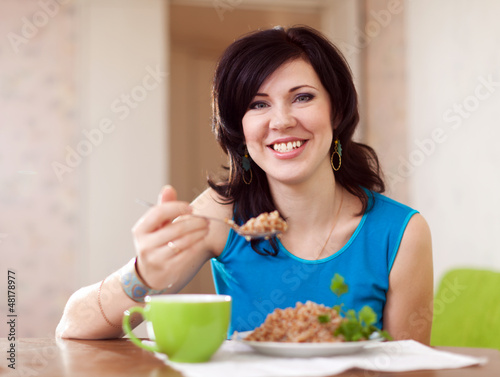  woman eating buckwheat