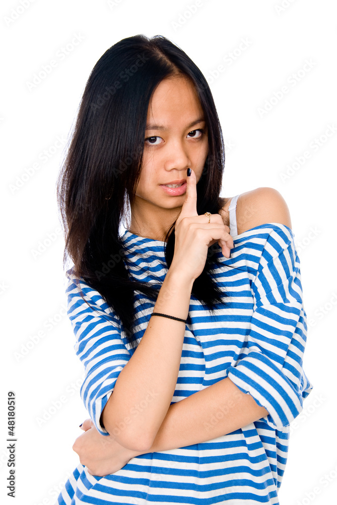 Beautiful woman with her finger to her lips Beautiful woman with her finger to her lips