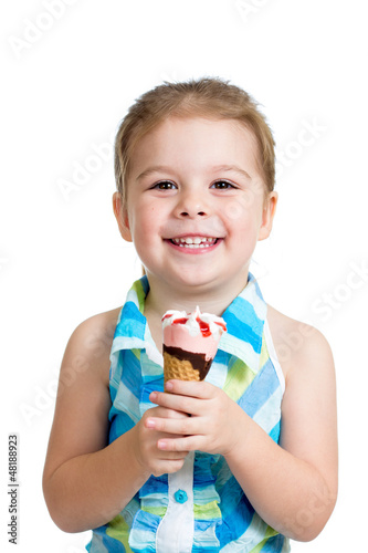 joyful child girl eating ic...