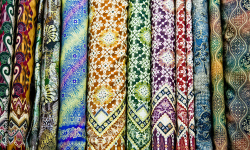 Colored textile in a traditional east bazaar, Yogyakarta on Java