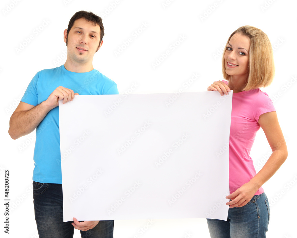Young couple holding blank poster isolated on white Young couple holding blank poster isolated on white