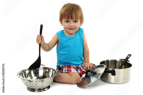 cute little boy with kitche...