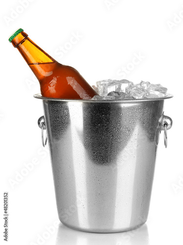 Beer bottle in ice bucket isolated on white