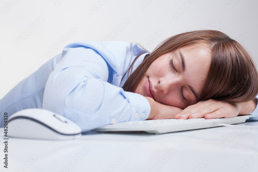 Woman tired at work Woman tired at work