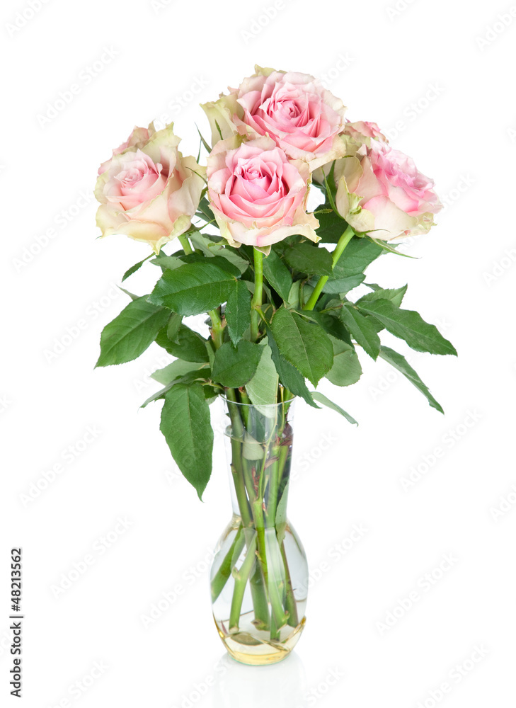 Bouquet of pink roses in a vase, isolated on white