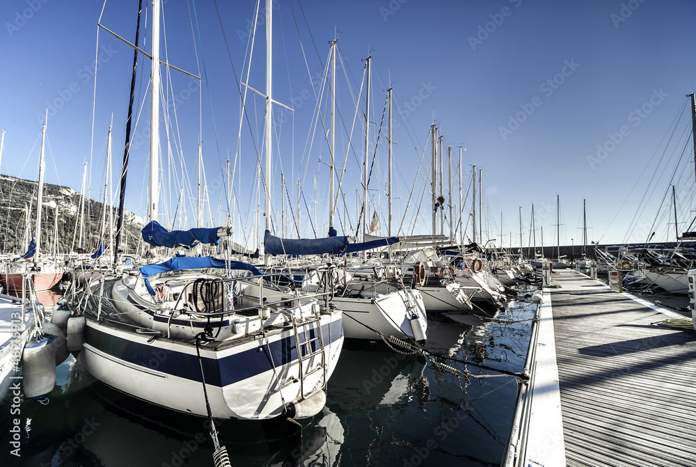 Sailboats in harbor.Italy