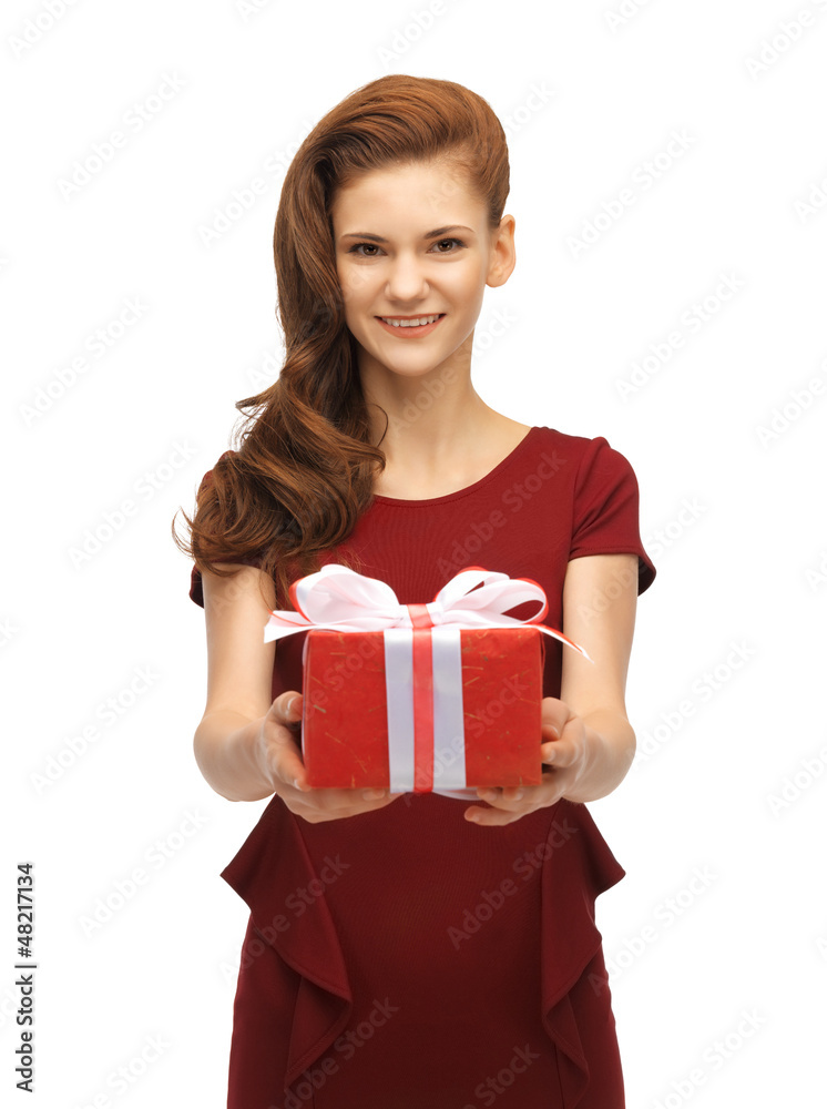 teenage girl in red dress with gift box teenage girl in red dress with gift box